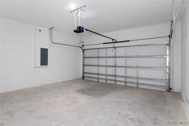 1067 W Cary Dr, Citrus Springs, FL 34434 - garage with electric panel, a garage door opener, and concrete block wall