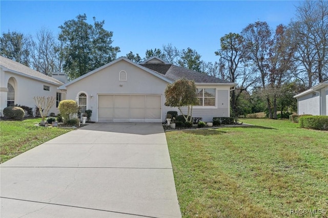 ranch-style home featuring a garage, a front yard, driveway, and stucco siding