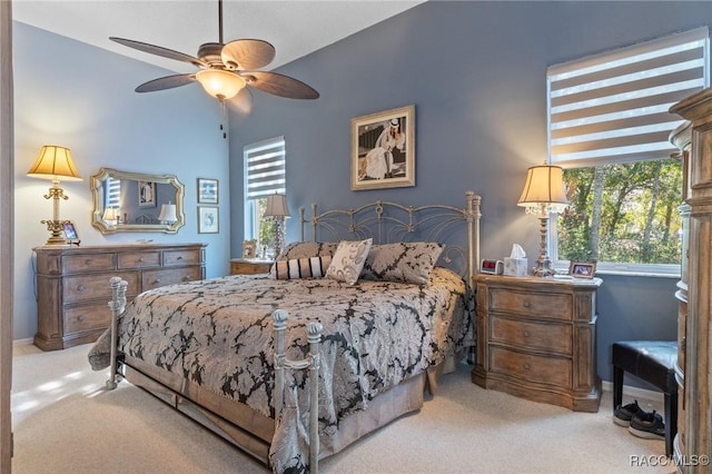 bedroom with carpet, baseboards, and a ceiling fan