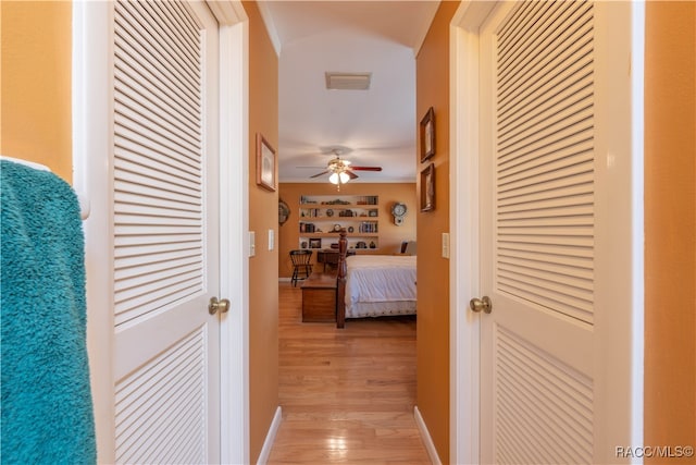 corridor featuring light hardwood / wood-style flooring