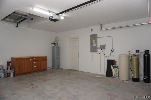 garage with a garage door opener, electric panel, and electric water heater