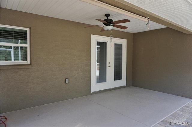 view of patio / terrace with french doors and ceiling fan