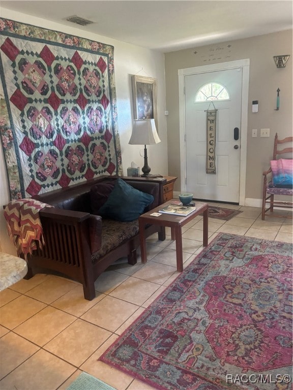 sitting room featuring light tile patterned flooring