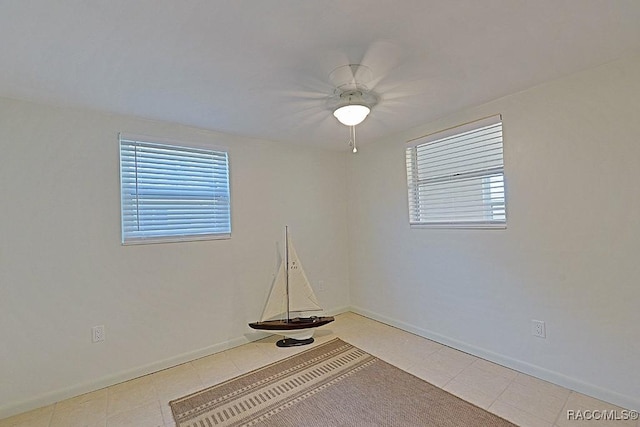 spare room with light tile patterned floors