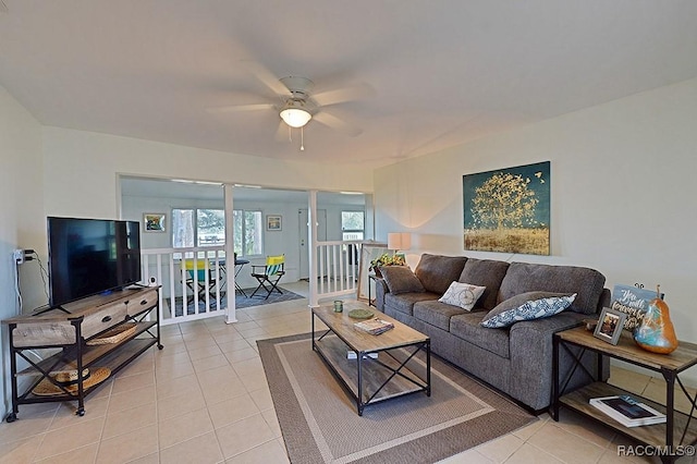 tiled living room featuring ceiling fan