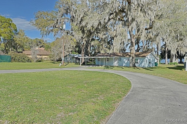 view of front of home with a front lawn