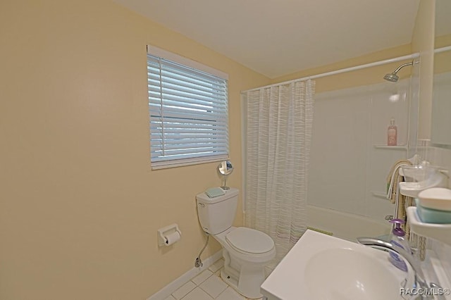 full bathroom featuring tile patterned flooring, sink, toilet, and shower / bathtub combination with curtain