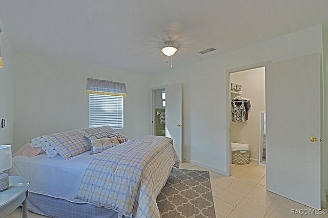 bedroom featuring ceiling fan and light tile patterned floors