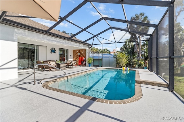 view of pool featuring a lanai, an outdoor living space, and a patio area