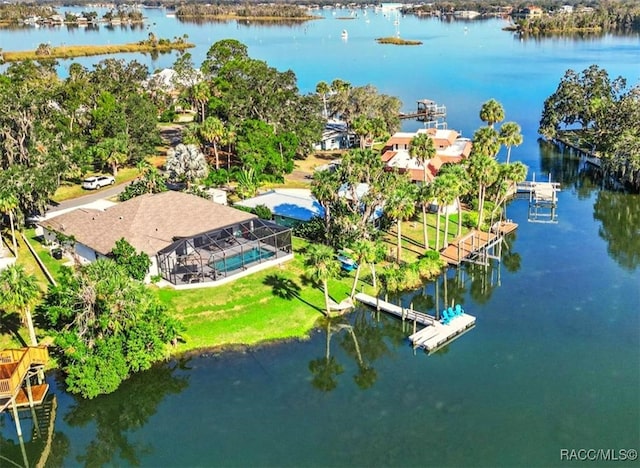 bird's eye view with a water view