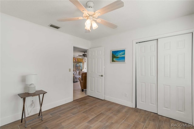 bedroom featuring a closet and ceiling fan