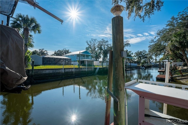 view of dock with a water view