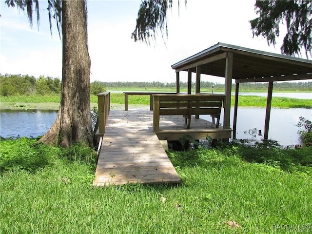 view of dock with a water view