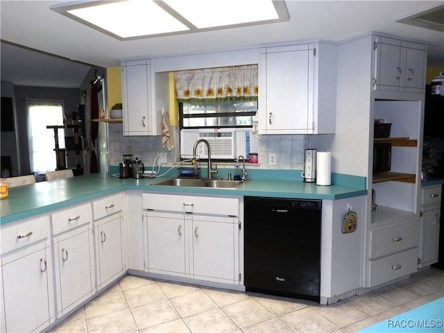 kitchen with white cabinetry, dishwasher, sink, tasteful backsplash, and light tile patterned flooring