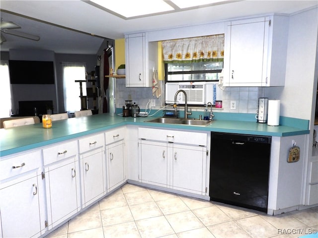 kitchen with white cabinetry, dishwasher, sink, decorative backsplash, and light tile patterned floors