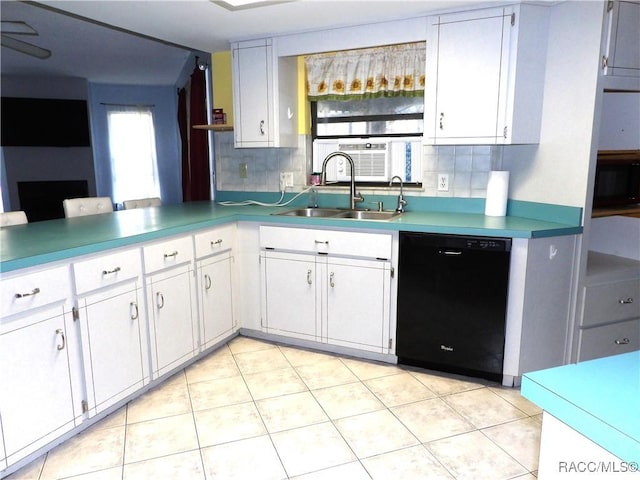 kitchen featuring white cabinetry, sink, and black appliances