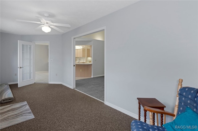 interior space featuring ceiling fan