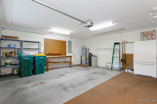 garage featuring ceiling fan, water heater, white fridge, electric panel, and a garage door opener