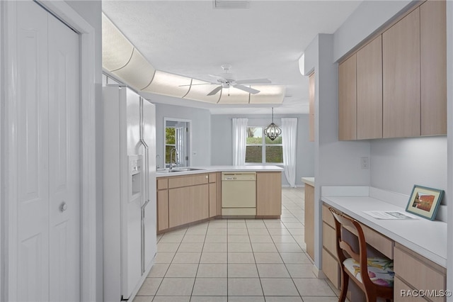 kitchen with ceiling fan with notable chandelier, white appliances, sink, light brown cabinets, and light tile patterned floors