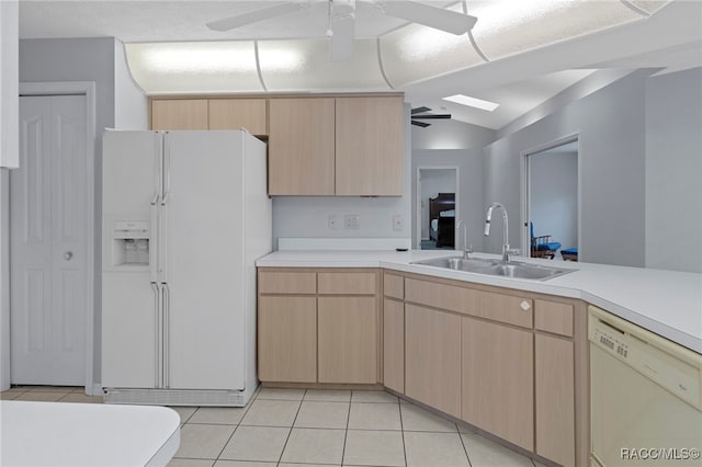 kitchen with light brown cabinetry, white appliances, ceiling fan, sink, and light tile patterned floors