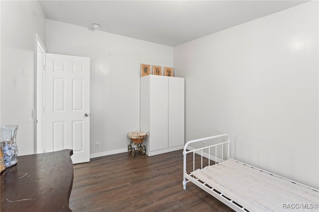7187 Montier St, Weeki Wachee, FL 34613 - bedroom featuring wood finished floors and baseboards