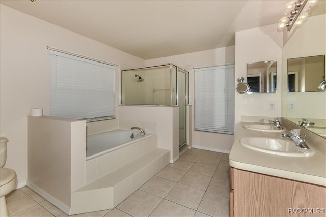 full bathroom with tile patterned flooring, vanity, toilet, and plus walk in shower