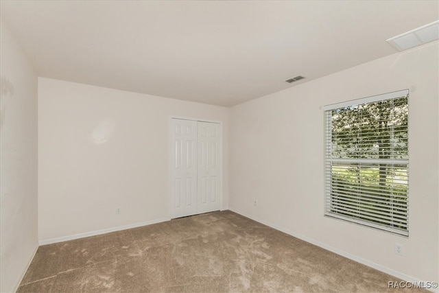 view of carpeted spare room