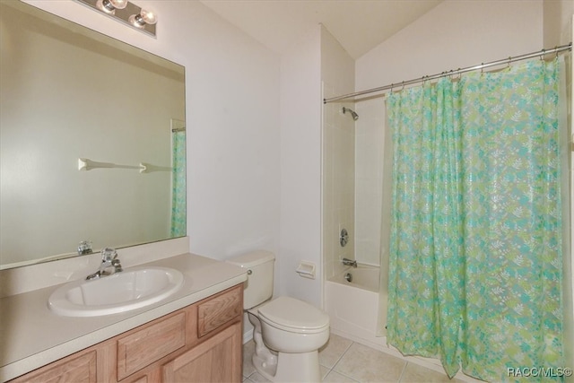 full bathroom featuring tile patterned floors, vaulted ceiling, toilet, vanity, and shower / tub combo