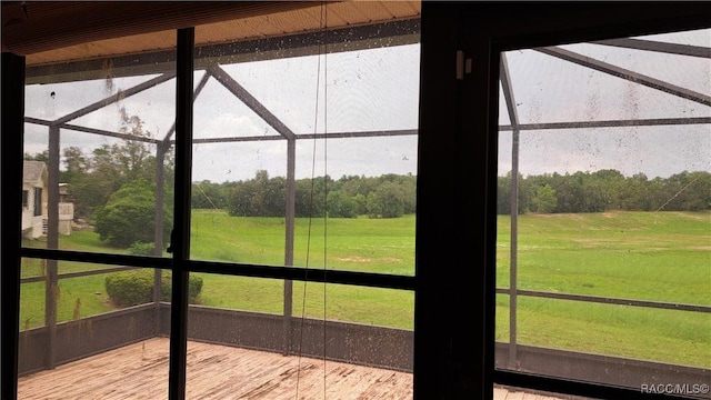 735 W Colbert Ct, Beverly Hills, FL 34465 - unfurnished sunroom with a rural view