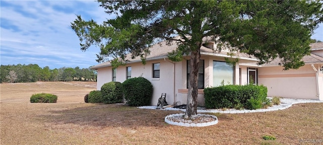 view of side of property with a yard