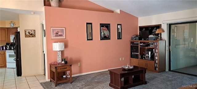 tiled living room with lofted ceiling