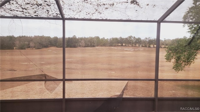 view of yard featuring glass enclosure