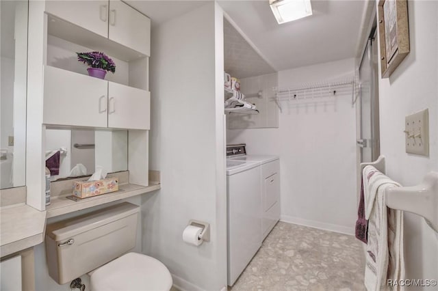 laundry room with separate washer and dryer