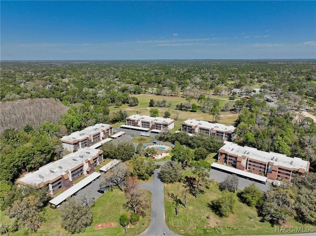 aerial view featuring a view of trees