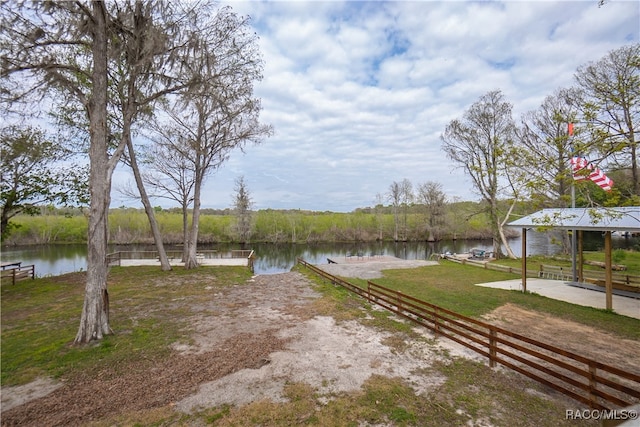 exterior space with a water view