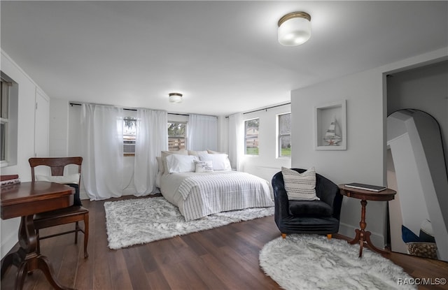 bedroom with wood-type flooring