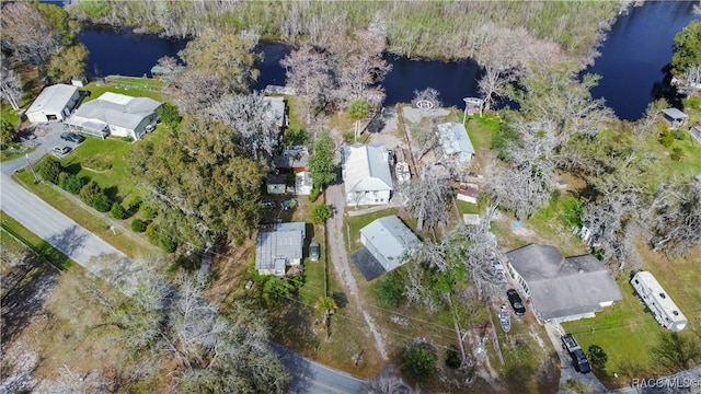 bird's eye view with a water view