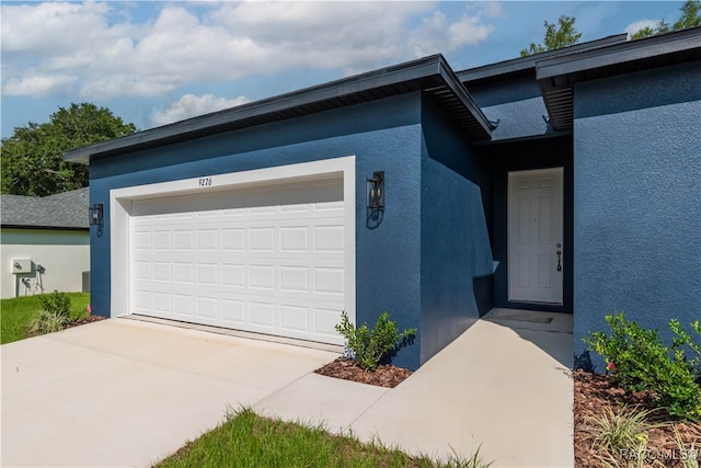 exterior space with a garage