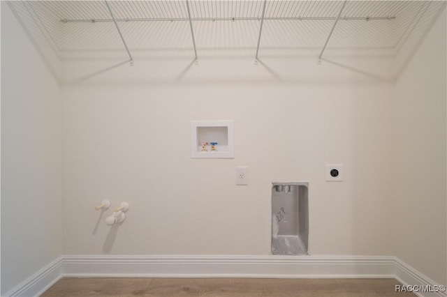 laundry room featuring hookup for an electric dryer, hookup for a washing machine, and hookup for a gas dryer