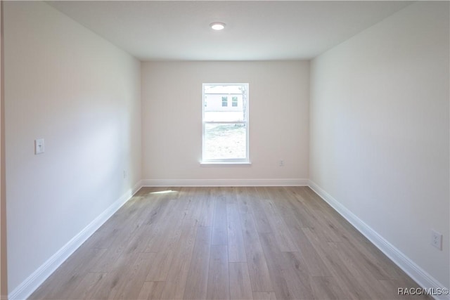 empty room with light wood-type flooring