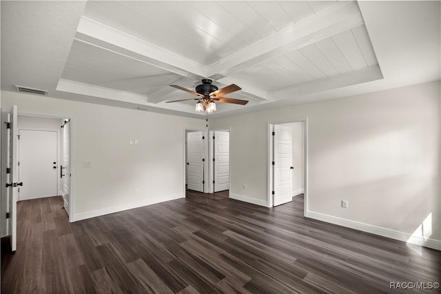 spare room featuring beam ceiling, ceiling fan, and dark wood-type flooring