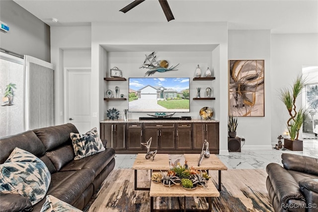 living room featuring ceiling fan