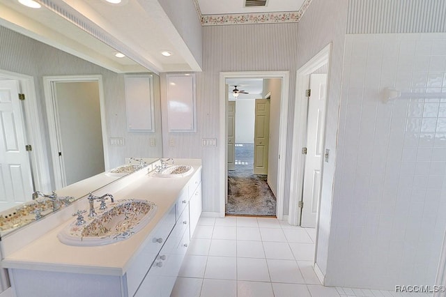 bathroom featuring tile patterned floors, vanity, and ceiling fan