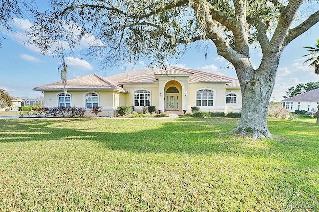 view of front of home with a front yard