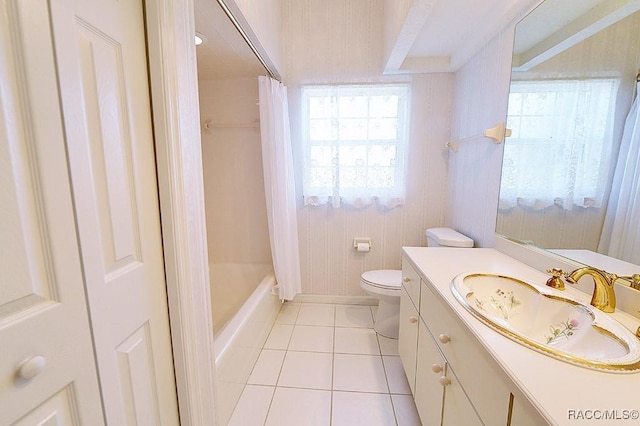 full bathroom featuring toilet, tile patterned flooring, vanity, and shower / tub combo