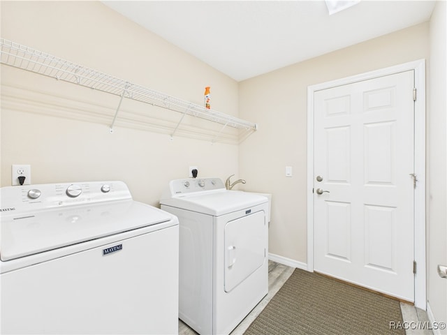 178 W Navarro Pl, Citrus Springs, FL 34434 - laundry area with washer and dryer and baseboards
