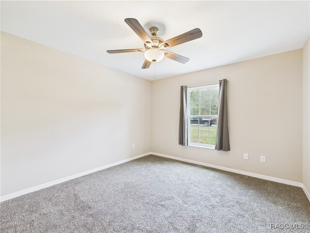178 W Navarro Pl, Citrus Springs, FL 34434 - empty room featuring carpet floors, a ceiling fan, and baseboards