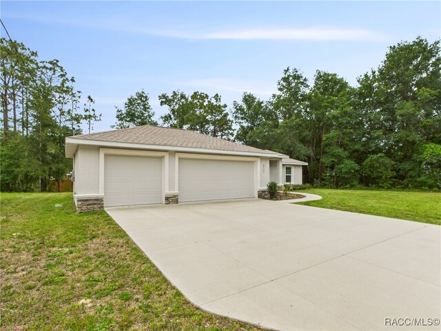 178 W Navarro Pl, Citrus Springs, FL 34434 - view of front facade with a garage, stone siding, a front lawn, stucco siding, and concrete driveway