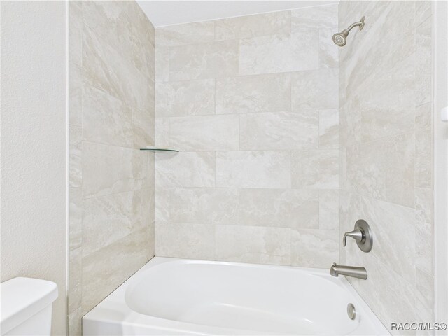 178 W Navarro Pl, Citrus Springs, FL 34434 - full bathroom featuring toilet and  shower combination