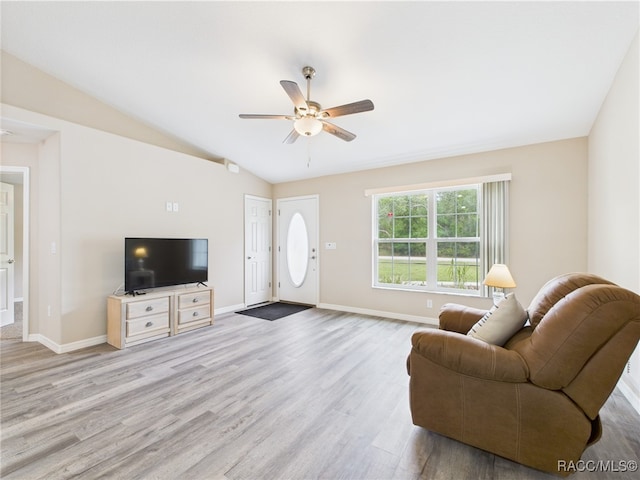 178 W Navarro Pl, Citrus Springs, FL 34434 - living area featuring ceiling fan, wood finished floors, baseboards, and lofted ceiling